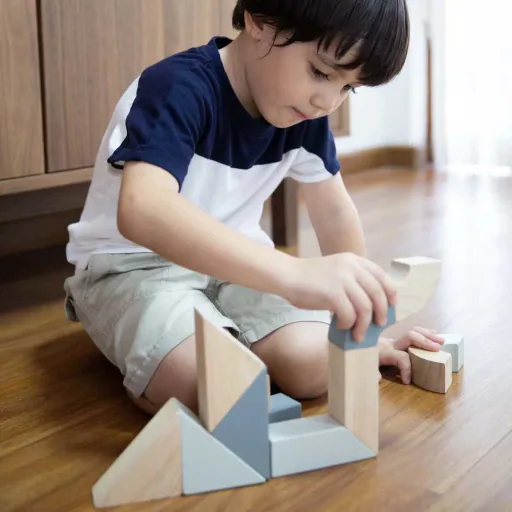 Plan Toys drehbare Holzklötze grau schwarz Holz