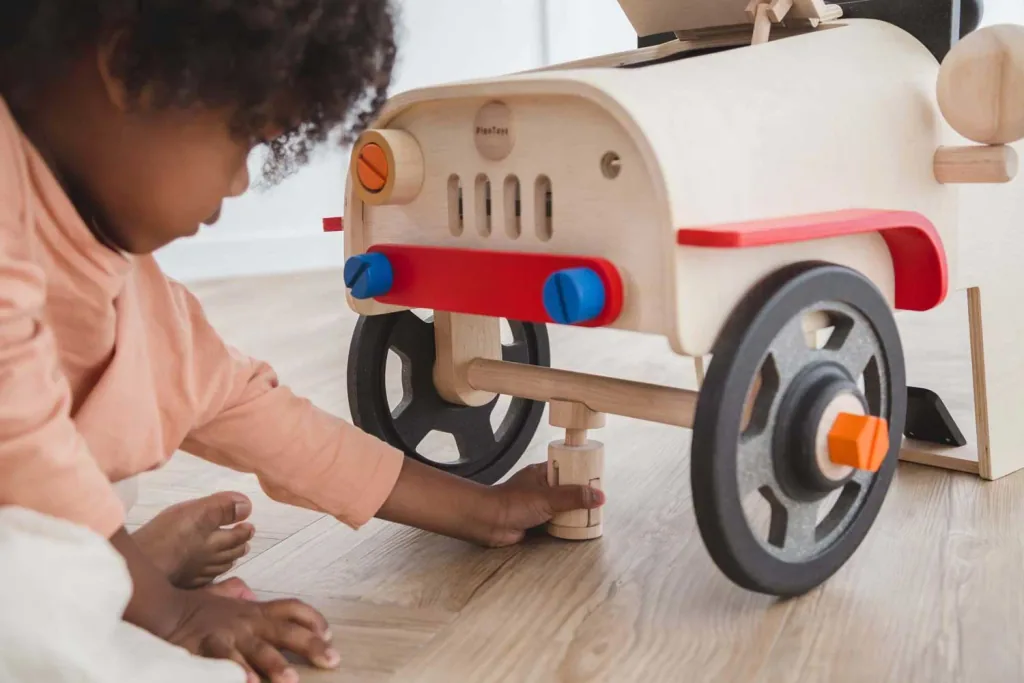 Plan Toys Spielzeug Automechaniker/Fahrsimulator Holz